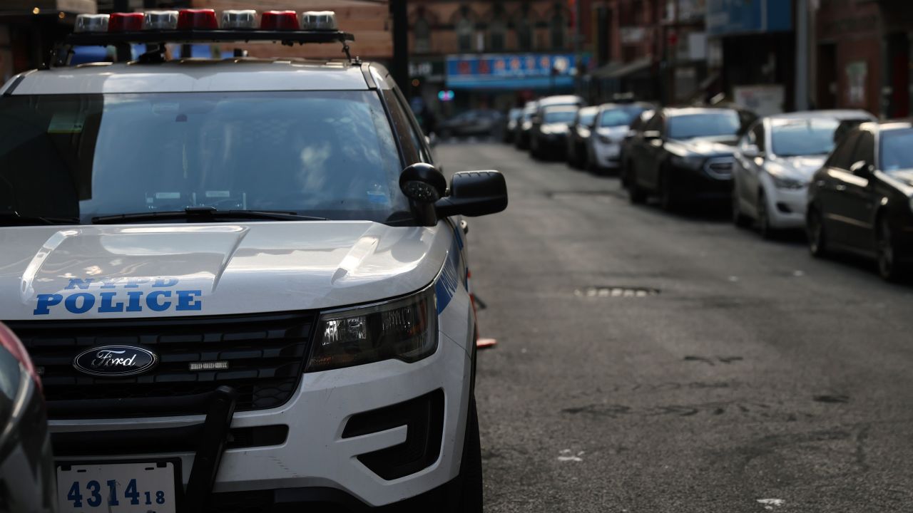 A police car drives through Manhattan on January 14, 2021, in New York.