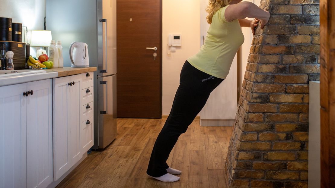 Wall push-ups strengthen the chest, shoulder and arm muscles.