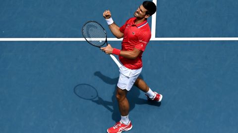 MELBOURNE, AUSTRALIA - FEBRUARY 02: Novak Djokovic of Serbia celebrates winning his Group A singles match against Denis Shapovalov of Canada during day one of the 2021 ATP Cup at Rod Laver Arena on February 02, 2021 in Melbourne, Australia. (Photo by Quinn Rooney/Getty Images)