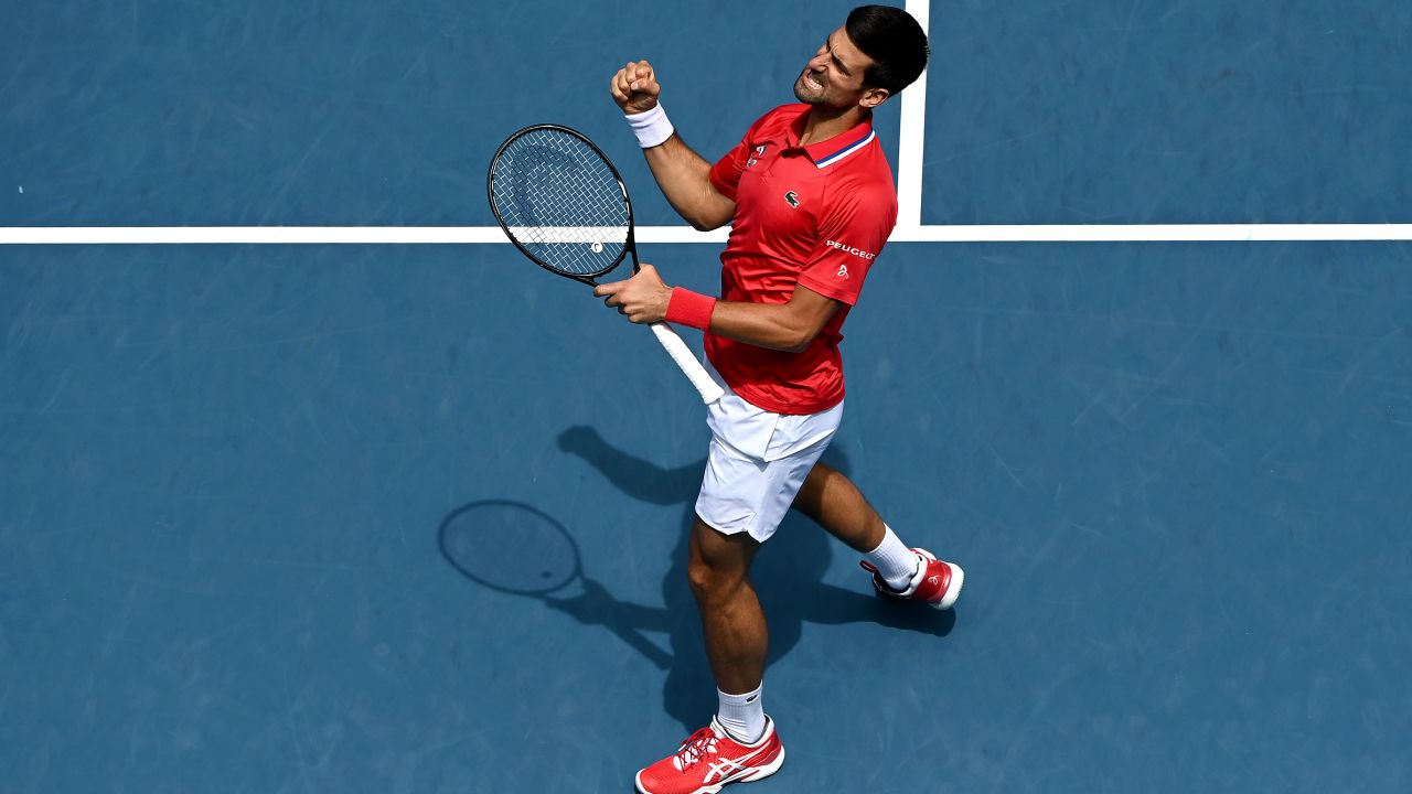 MELBOURNE, AUSTRALIA - FEBRUARY 02: Novak Djokovic of Serbia celebrates winning his Group A singles match against Denis Shapovalov of Canada during day one of the 2021 ATP Cup at Rod Laver Arena on February 02, 2021 in Melbourne, Australia. (Photo by Quinn Rooney/Getty Images)