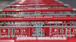 Shopping carts are lined up in front of a Costco store on February 25, 2021 in Inglewood, California.