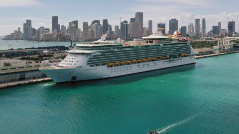 MIAMI, FLORIDA - MARCH 02: An aerial view from a drone shows Royal Caribbean’s Navigator of the Sea cruise ship docked at PortMiami on March 02, 2021 in Miami, Florida. Royal Caribbean Group announced plans to use the proceeds from a $1.5 billion sale of shares to pay off debt stemming from the pandemic. (Photo by Joe Raedle/Getty Images)