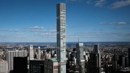 NEW YORK, NEW YORK - MARCH 04:  The private residence 432 Park Avenue towers above office buildings which stand largely empty on March 04, 2021 in New York City. According to Colliers International, in January the office available rate in Manhattan rose to 14.9%, which is the highest level on record dating back to 2000. Some companies are slowly asking employees to return to the office while other's are waiting for more New Yorkers to receive the vaccine for Covid-19. (Photo by Spencer Platt/Getty Images)