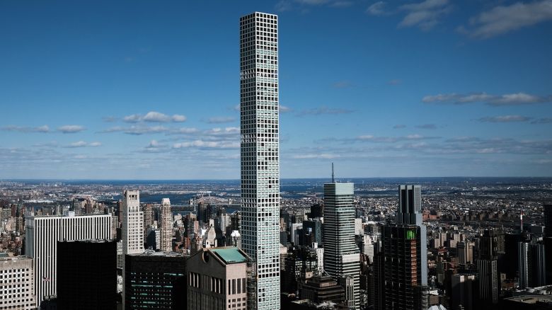 NEW YORK, NEW YORK - MARCH 04:  The private residence 432 Park Avenue towers above office buildings which stand largely empty on March 04, 2021 in New York City. According to Colliers International, in January the office available rate in Manhattan rose to 14.9%, which is the highest level on record dating back to 2000. Some companies are slowly asking employees to return to the office while other's are waiting for more New Yorkers to receive the vaccine for Covid-19. (Photo by Spencer Platt/Getty Images)