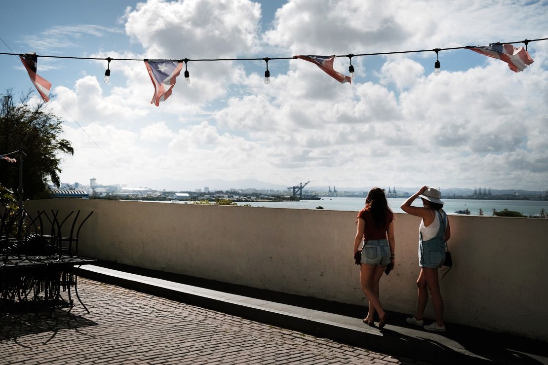 Visitors walk through Old San Juan in Puerto Rico.