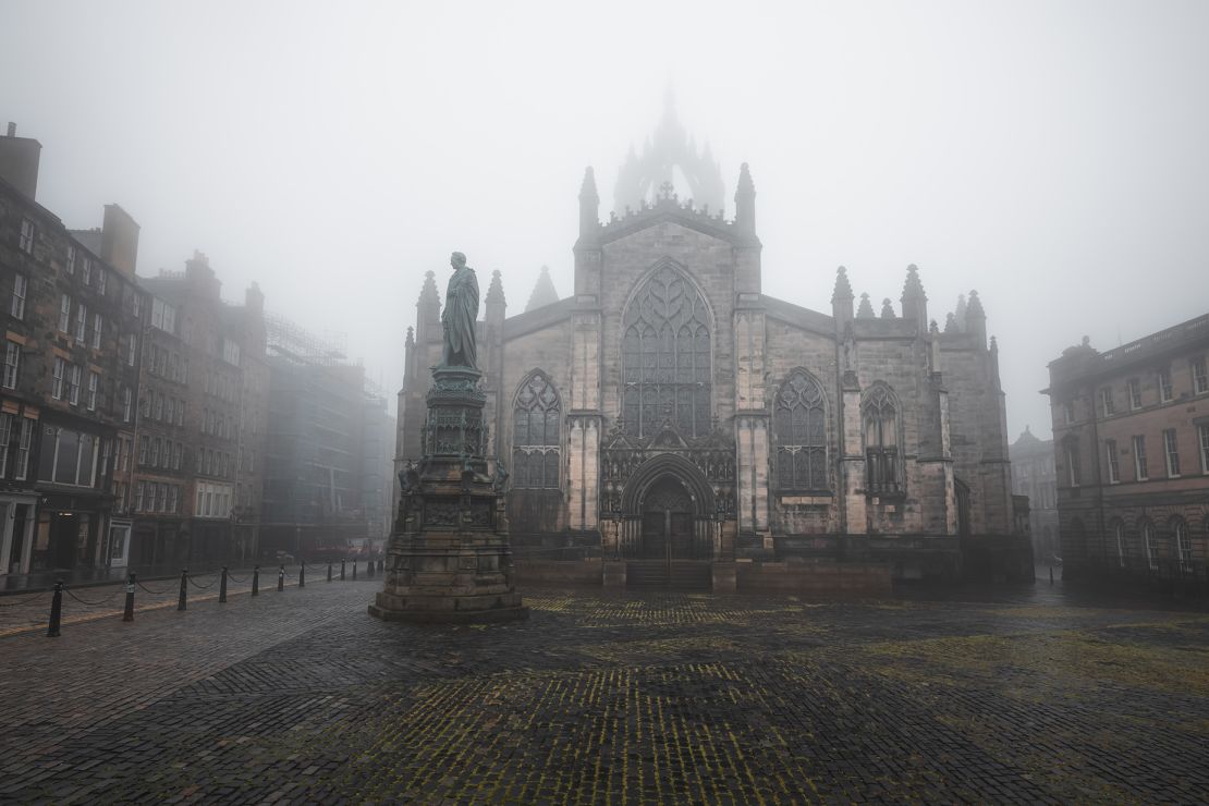 Amelia and Lucas embarked on an Edinburgh ghost tour together, around the city's atmospheric Old Town. Pictured here: the city's gothic St Giles' Cathedral on the Royal Mile, photographed in the fog.