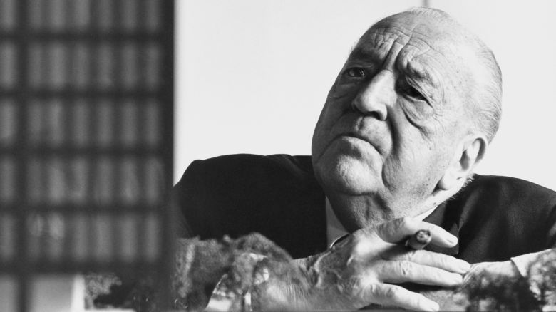 Portrait of German-American architect Ludwig Mies van der Rohe (1886 - 1969), a cigar in his hand, as he looks at a model of his design for the Toronto-Dominion Centre, Chicago, Illinois, 1968. (Photo by Hans Namuth/Photo Researchers History/Getty Images)