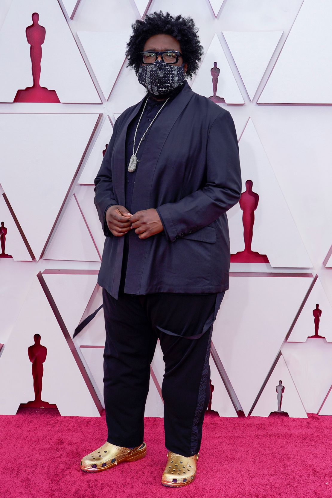 Questlove attends the 93rd Annual Academy Awards on April 25, 2021 in bold gold Crocs matching the color of an Oscar statuette.