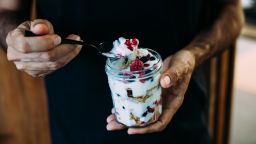 Dessert with vegan yoghurt, digestive biscuits and berries