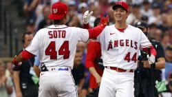 DENVER, COLORADO - JULY 12:Juan Soto #22 of the Washington Nationals high-fives Shohei Ohtani #17 of the Los Angeles Angels  during the 2021 T-Mobile Home Run Derby at Coors Field on July 12, 2021 in Denver, Colorado. (Photo by Justin Edmonds/Getty Images)