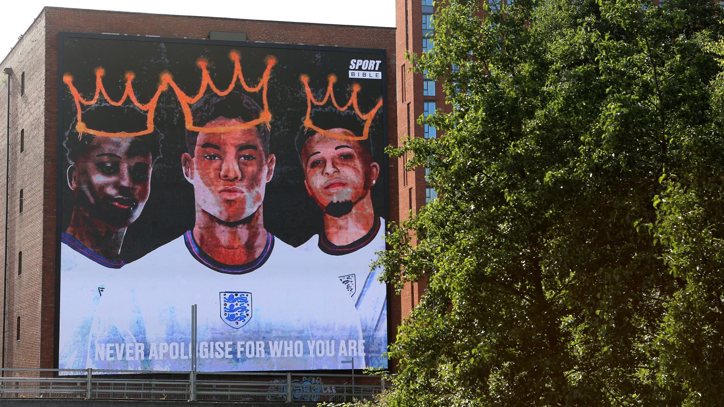 A mural in Manchester, England in 2021 expresses support for three England footballers — Marcus Rashford, Jadon Sancho and Bukayo Saka — who were targeted with racist abuse online after they missing penalty shots in the Euro 2020 final, which led to their team's defeat by Italy.