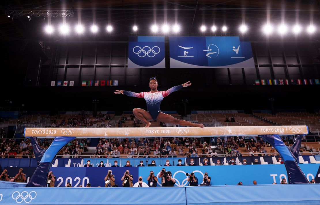 Biles competes on balance beam at the Tokyo Olympics.