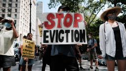 NEW YORK, NEW YORK - AUGUST 11: Activists hold a protest against evictions near City Hall on August 11, 2021 in New York City. New York stateâs current eviction moratorium is set to expire on August 31. The Emergency Rental Assistance Program, which was created in the state budget and is meant to cover a yearâs worth of rent and utility bills for tenants at or below 80% of area median income, has struggled to address the thousands of caseloads of tenants facing eviction. (Photo by Spencer Platt/Getty Images)