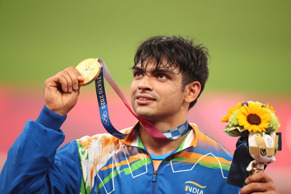 Neeraj Chopra of India on the podium after winning the gold medal in the men's javelin at the 2020 Summer Olympic Games on August 7, 2021 in Tokyo.