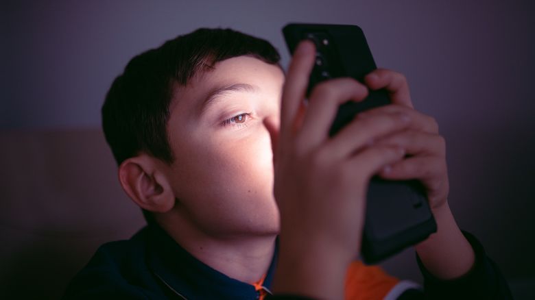 Boy Engrossed on Phone