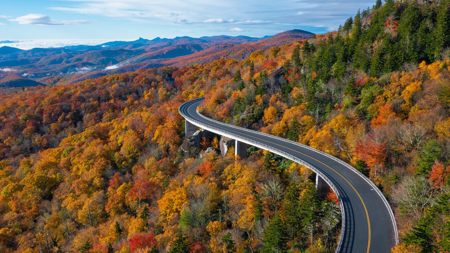 Hugging Grandfather Mountain in North Carolina, the <a  target="_blank">Linn Cove Viaduct</a> is a graceful stretch of road on the Blue Ridge Parkway, especially when the leaves are putting on their autumn show.