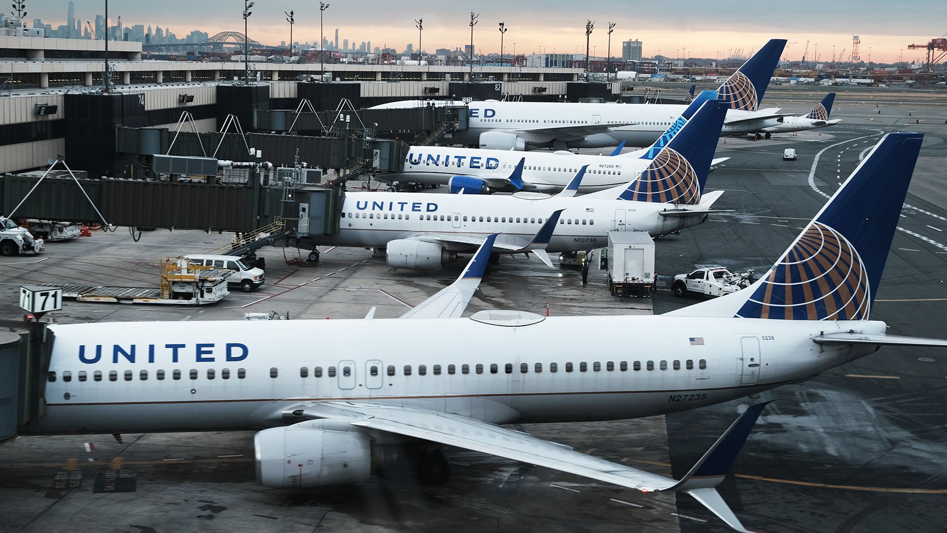 United Airlines planes sit on the runway at Newark Liberty International Airport in New Jersey. The company hopes to shave a few precious minutes in the boarding procedure and get planes in the air a little more quickly.