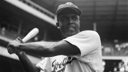 Jackie Robinson, the first African American to play in the modern major leagues, ahead of a game against the Pittsburgh Pirates on August 28, 1949.