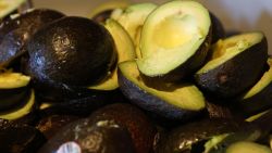 SAN FRANCISCO, CALIFORNIA - FEBRUARY 09: Fresh avocados sit in a bowl while guacamole is prepared at Tommy's Mexican Restaurant on February 09, 2022 in San Francisco, California. A week ahead of Super Bowl Sunday, the price of fresh avocado and guacamole is surging as the popular fruit is facing supply chain issues. According to report by Bloomberg News, the price of avocados from the Michoacan growing region in Mexico have reached the highest level in two decades with a 20 pound case selling for approximately $26. Americans consume more avocado and guacamole on Super Bowl Sunday than any other day in a typical year. (Photo by Justin Sullivan/Getty Images)