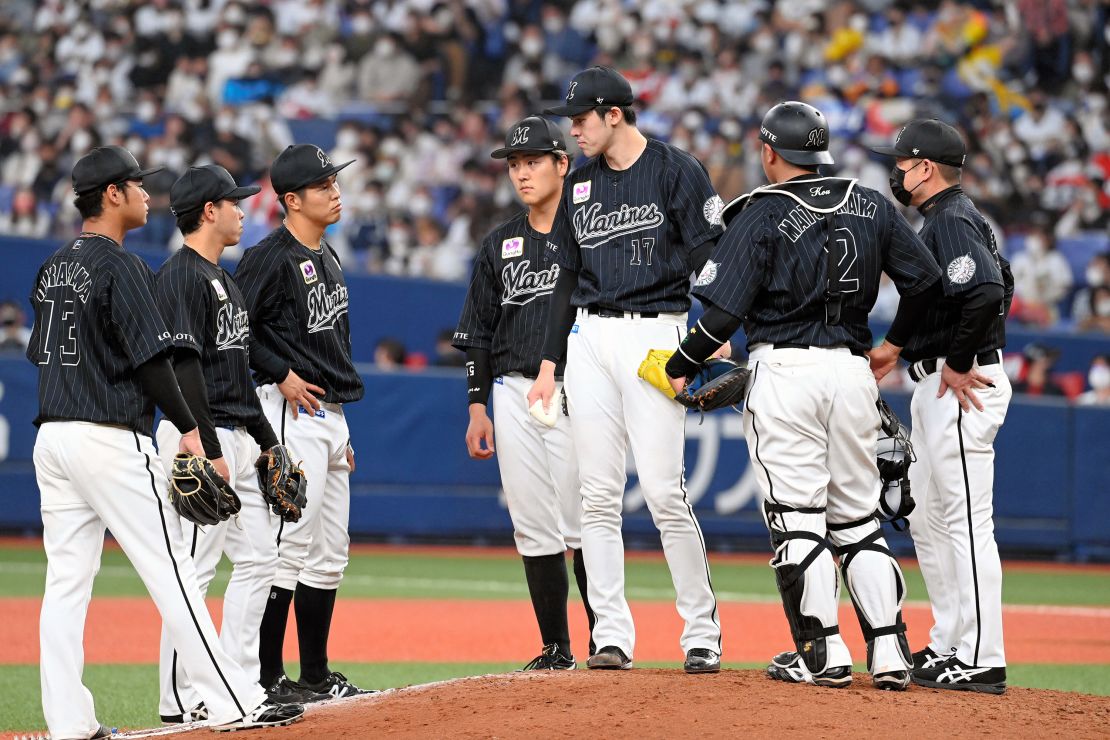 OSAKA, JAPAN - APRIL 24: Infielders gathers to speak to Roki Sasaki #17 of the Chiba Lotte Marines in the 4th inning against Orix Buffaloes at Kyocera Dome Osaka on April 24, 2022 in Osaka, Japan. (Photo by The Asahi Shimbun via Getty Images)