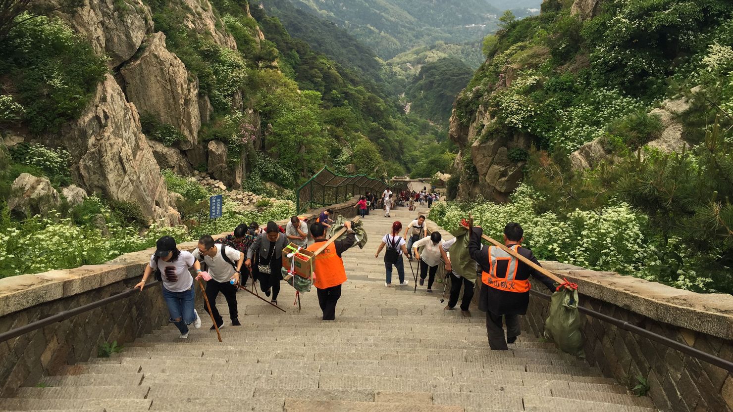 In China, people are hiring ‘climbing buddies’ for big money. The more attractive they are, the higher the price