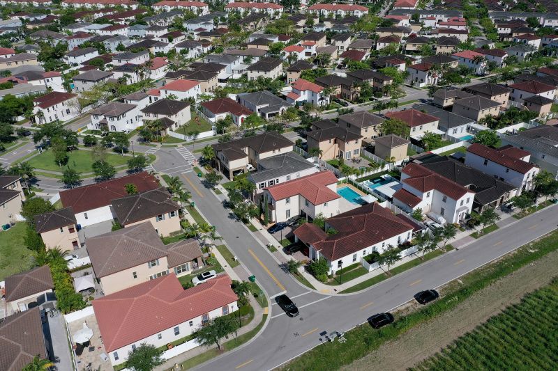 MIAMI, FLORIDA - MAY 10:  In an aerial view, single family homes are shown in a residential neighborhood on May 10, 2022 in Miami, Florida. New published data has hinted at improvement in the supply of homes for sale as April's numbers show inventory down 12 percent from the same month last year, the smallests yearly decline since the end of 2019.  (Photo by Joe Raedle/Getty Images)