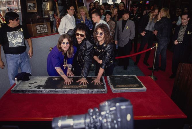 Osbourne, Iommi and Butler leave their handprints as they are inducted into the Hollywood RockWalk in 1992.