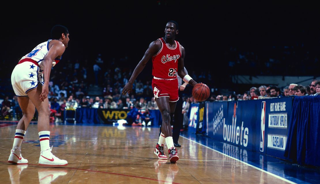 Michael Jordan dribbles the ball up court during an NBA basketball game circa 1985 at the Capital Centre in Landover, Maryland.