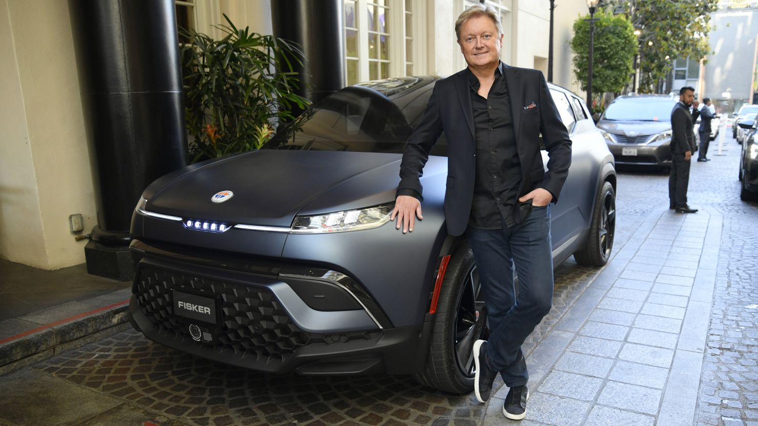 Car designer Henrik Fisker poses with a Fisker Ocean automobile in Los Angeles, United States, in June 2022.