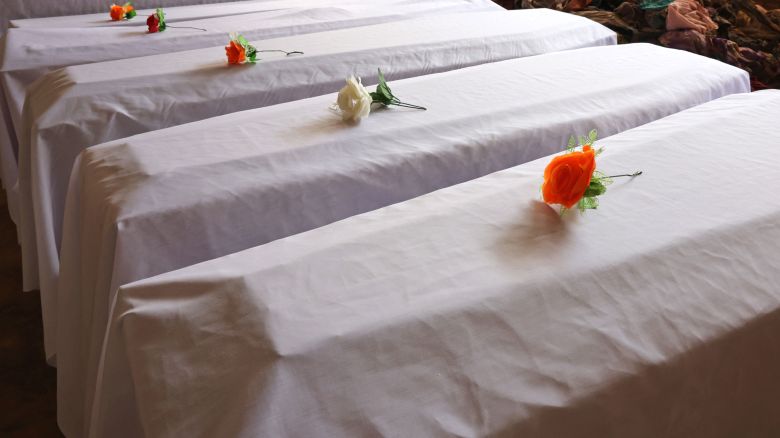 Coffins containing victims of the Rwandan Genocide are displayed at the Nyamata Church Genocide Memorial for Victims of the 1994 Rwandan genocide in Nyamata, Rwanda, on June 22, 2022.