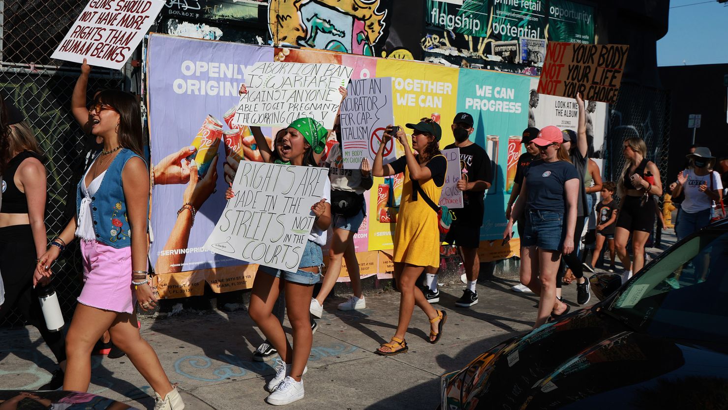 Marchers protest the US Supreme Court's decision in the Dobbs v. Jackson Women's Health case on June 24, 2022, in Miami.