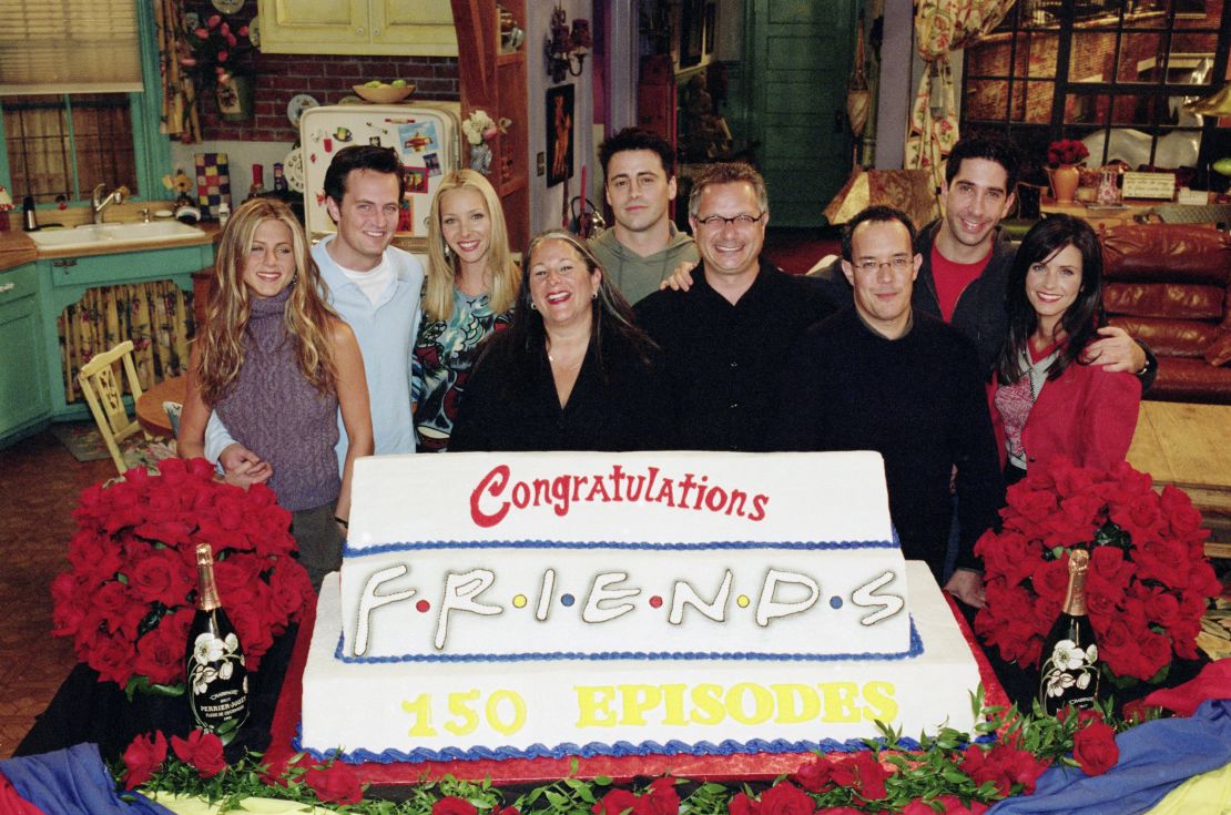 (From left) Jennifer Aniston, Matthew Perry, Lisa Kudrow, Marta Kauffman, Matt LeBlanc, Kevin S. Bright, David Crane, David Schwimmer and Courteney Cox on the 'Friends' set in 2000.