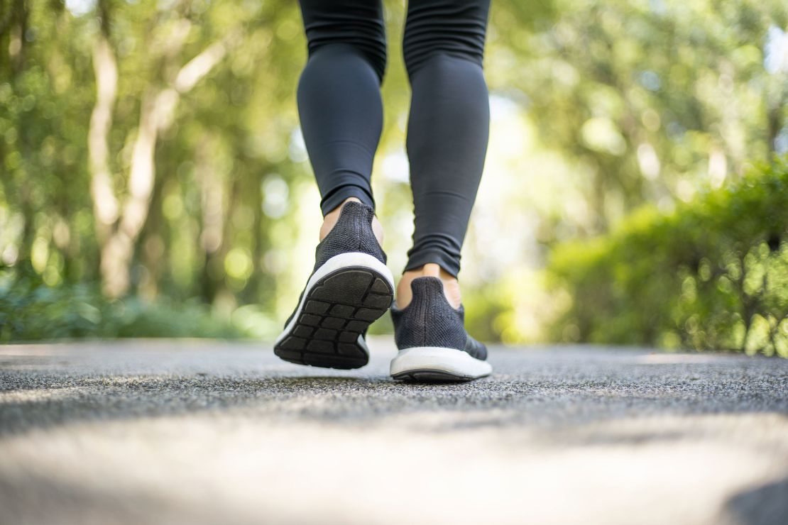 To increase the difficulty of daily walks, experts recommend adding weights for resistance and walking quickly enough to be out of breath.