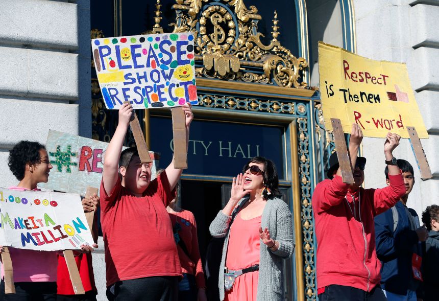 People are resisting the r-word's return when they see it, pointing out its history of harm. (Pictured, students and teachers in San Francisco rally to protest the use of the r-word in 2017.)