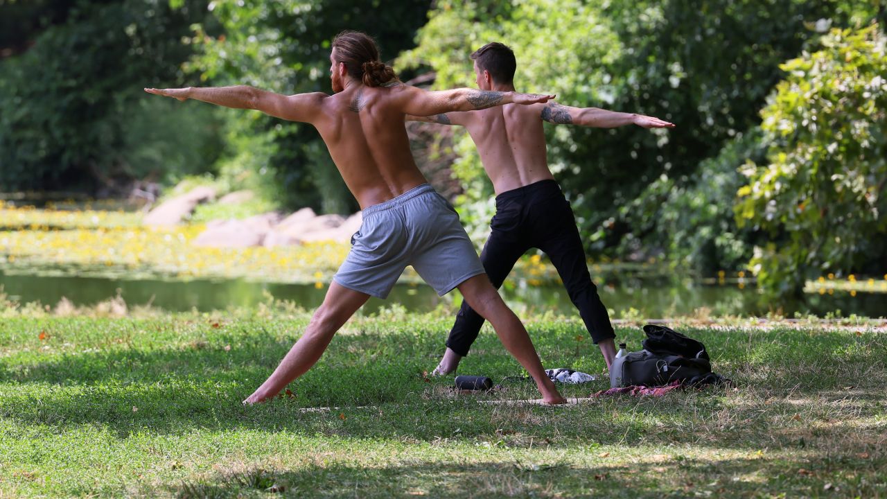 NEW YORK, NEW YORK - AUGUST 09: People do yoga in Prospect Park on August 09, 2022 in the Flatbush neighborhood of Brooklyn borough in New York City. A heat advisory remains in effect for New York City and the Northeast as the region continues to experience high heat and humidity. Temperatures in New York City are expected to reach 96 degrees. (Photo by Michael M. Santiago/Getty Images)