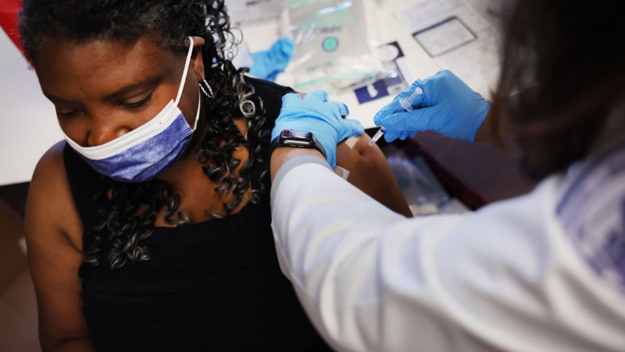 CHICAGO, ILLINOIS - SEPTEMBER 09: Margaret LaRaviere receives a COVID-19 booster during an event hosted by the Chicago Department of Public Health at the Southwest Senior Center on September 09, 2022 in Chicago, Illinois. The recently authorized booster vaccine protects against the original SARS-CoV-2 virus and the more recent omicron variants, BA.4 and BA.5.  (Photo by Scott Olson/Getty Images)