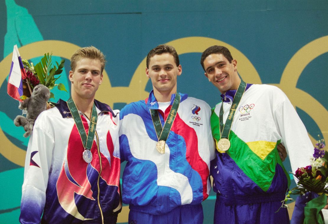 Hall, left, after he won the silver medal in the men's 100-meter freestyle at the 1996 Olympics in Atlanta.