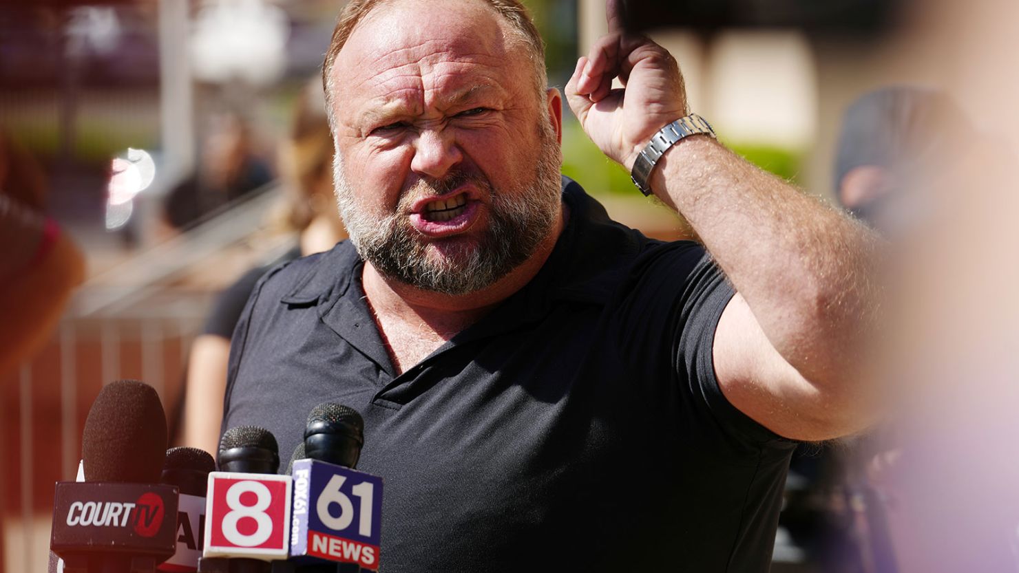 Infowars founder Alex Jones speaks to the media outside Waterbury Superior Court during his trial on September 21, 2022 in Waterbury, Connecticut.