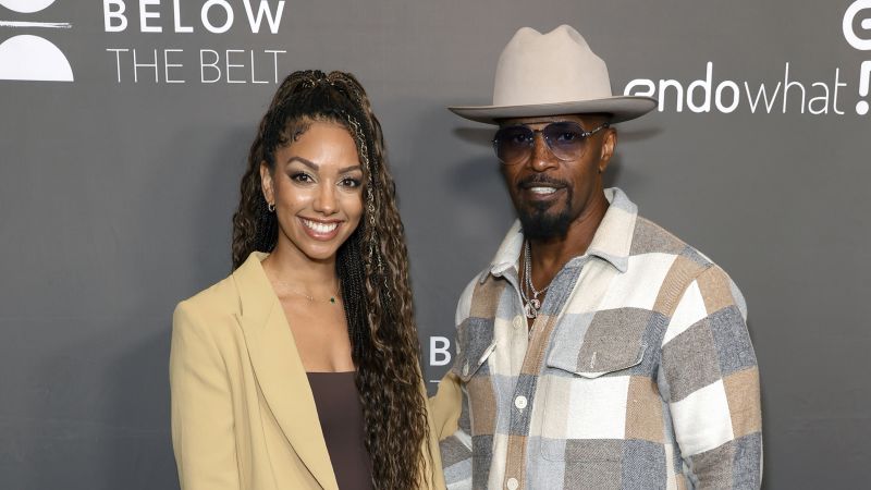 Jamie Foxx looked like a proud father as he led his daughter Corrine down the aisle