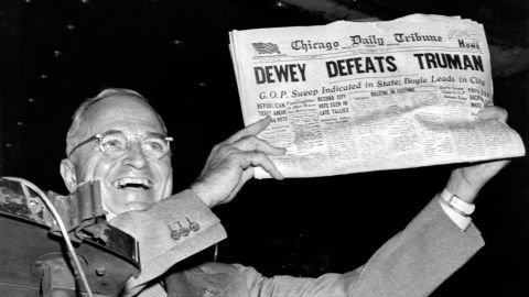 President Harry Truman holds up a copy of the Chicago Daily Tribune declaring his defeat to Thomas Dewey in the presidential election, St Louis, MIssouri, November 1948. (Photo by Underwood Archives/Getty Images)