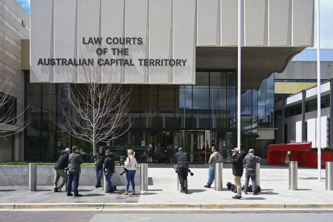CANBERRA, AUSTRALIA - OCTOBER 14: Media wait outside the court on October 14, 2022 in Canberra, Australia. Higgins appeared to give evidence in the trial of former Liberal Party political staffer Bruce Lehrmann, who is charged with sexually assaulting Higgins in the office of a government minister in March 2019. Lehrmann pleaded not guilty, and the trial continues. (Photo by Martin Ollman/Getty Images)