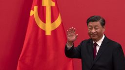 BEIJING, CHINA - OCTOBER 23: General Secretary and Chinese President, Xi Jinping waves as he leaves after speaking at a press event with  of the new Standing Committee of the Political Bureau of the Communist Party of China and  Chinese and Foreign journalists at The Great Hall of People on October 23, 2022 in Beijing, China. (Photo by Kevin Frayer/Getty Images)