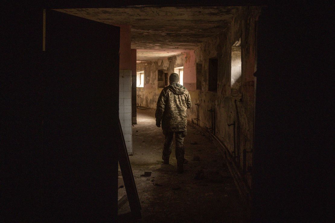 A Ukrainian soldier walks through the basement of a restaurant that was allegedly used as a torture site by Russian forces during the occupation of Snihurivka in southern Ukraine.