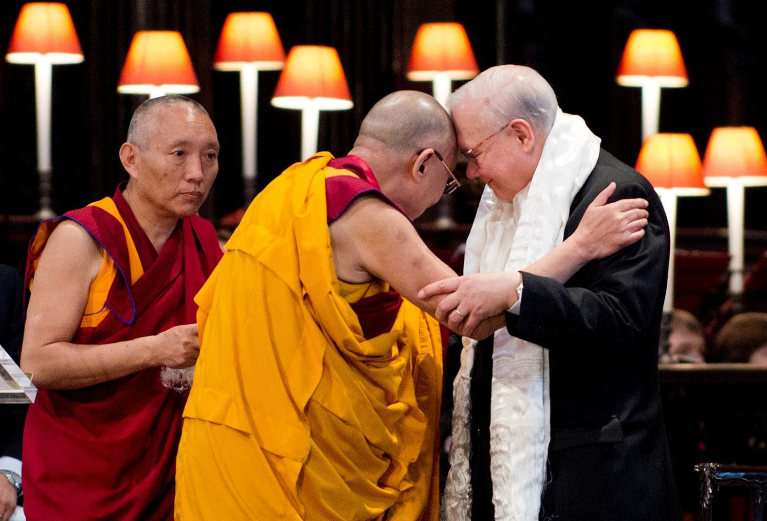 The Dalai Lama embraces John Templeton after receiving the Templeton Prize during a ceremony at St. Paul's Cathedral in London on May 14, 2012. The award honors "outstanding individuals who have devoted their talents to expanding our vision of human purpose and ultimate reality."