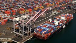 LONG BEACH, CA - OCTOBER 2: Shipping containers are left stacked in the Port of Los Angeles because of the West Coast lockout of dockworkers by shipping lines on October 2, 2002 in Long Beach, California. Hopes that federal mediation would resolve the impasse, which is costing an estimated $1 billion a day, were dashed October 1 after union representatives stormed out of a meeting after shippers showed up with armed security guards.  (Photo by David McNew/Getty Images) 