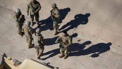 EL PASO, TEXAS - JANUARY 08: A Texas National Guard soldiers guard the U.S.-Mexico border on January 08, 2023 in El Paso, Texas. President Joe Biden visited El Paso Sunday, his first visit to the border since he became president two years before. U.S. Border authorities took into custody more than 2.5 million migrants in 2022, the highest number on record. (Photo by John Moore/Getty Images)