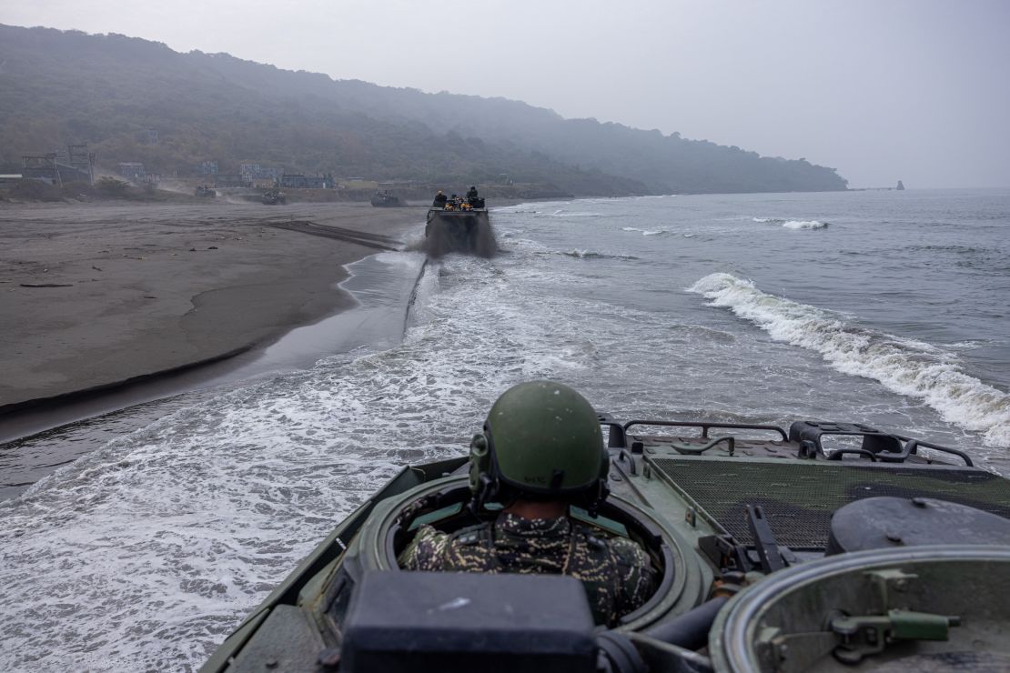 A Taiwanese soldier maneuvers an amphibious vehicle during a two-day military drill to show combat readiness at a base in Kaohsiung, in January last year.