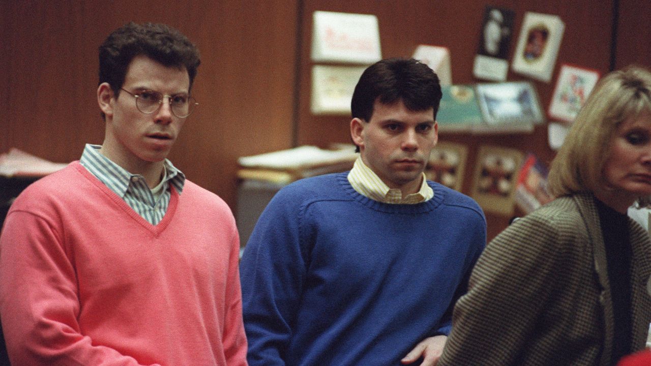 Erik Menendez (L) and his brother Lyle (R) listen during a pre-trial hearing, on December 29, 1992 in Los Angeles after the two pleaded innocent in the August 1989 shotgun deaths of their wealthy parents, Jose and Mary Louise Menendez of Beverly Hills, Calif. It took 40 months for the Superior Court arraignment after prosecutors and defense attorneys battled over the admissibility of taped confessions the brothers allegedly made to their psychotherapist. AFP PHOTO VINCE BUCCI (Photo by VINCE BUCCI / AFP) (Photo by VINCE BUCCI/AFP via Getty Images)