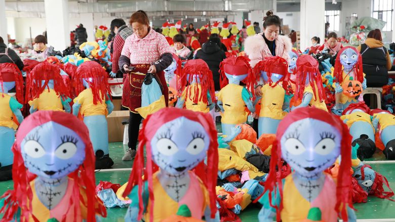 Employees make inflatable toys on the production line at a factory on February 15, 2023 in Huaibei, Anhui Province of China.