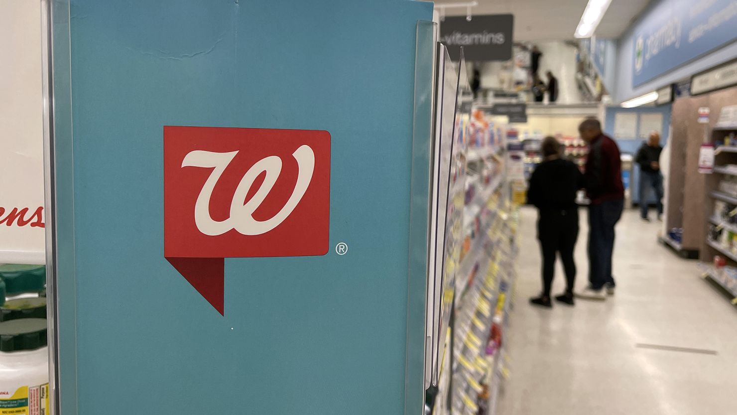 Customers shop at a Walgreens store in California.